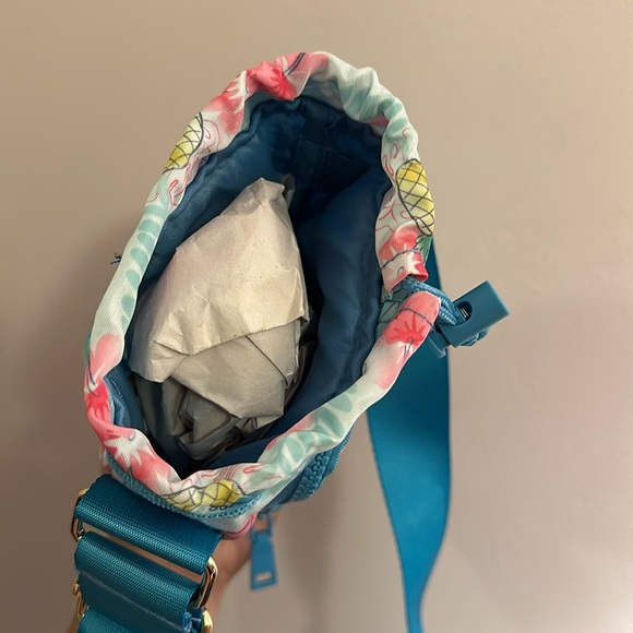Crossbody water bottle bag. Has a pocket for card, money and many more. NWT - Picture 3 of 5